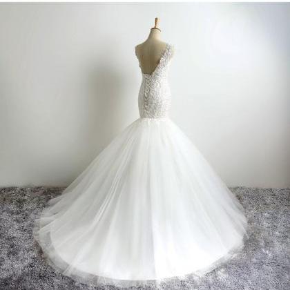Sexy White Lace Appliqued Beaded Wedding Dress..