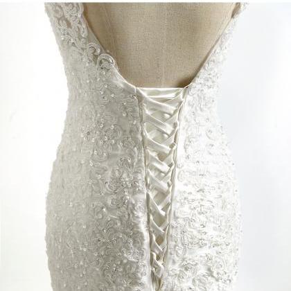 Sexy White Lace Appliqued Beaded Wedding Dress..