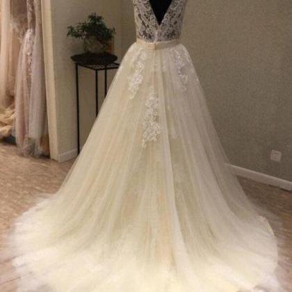 Elegant Sexy Backless Ivory Lace Wedding Dresses A..